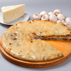 Осетинский пирог с грибами и сыром фото
