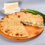 Осетинский пирог с сыром и луком фото