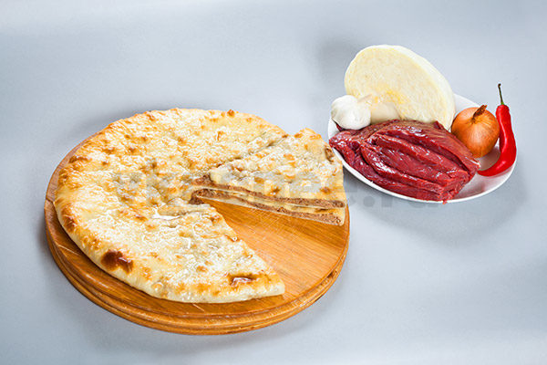 Осетинский пирог с капустой и мясом фото